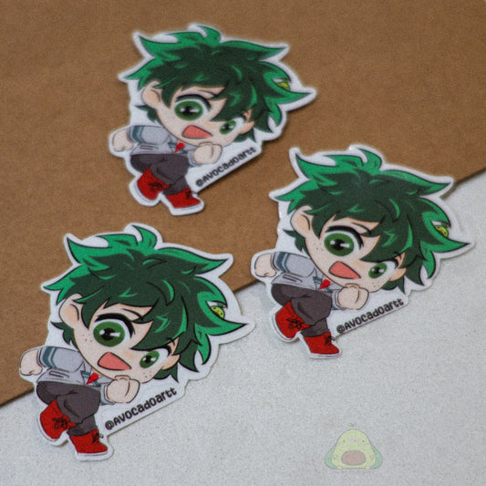 Handmade vinyl sticker of Midoriya (Deku) from My Hero Academia, designed by Avocado Artt, featuring his classic green hair and hero outfit.