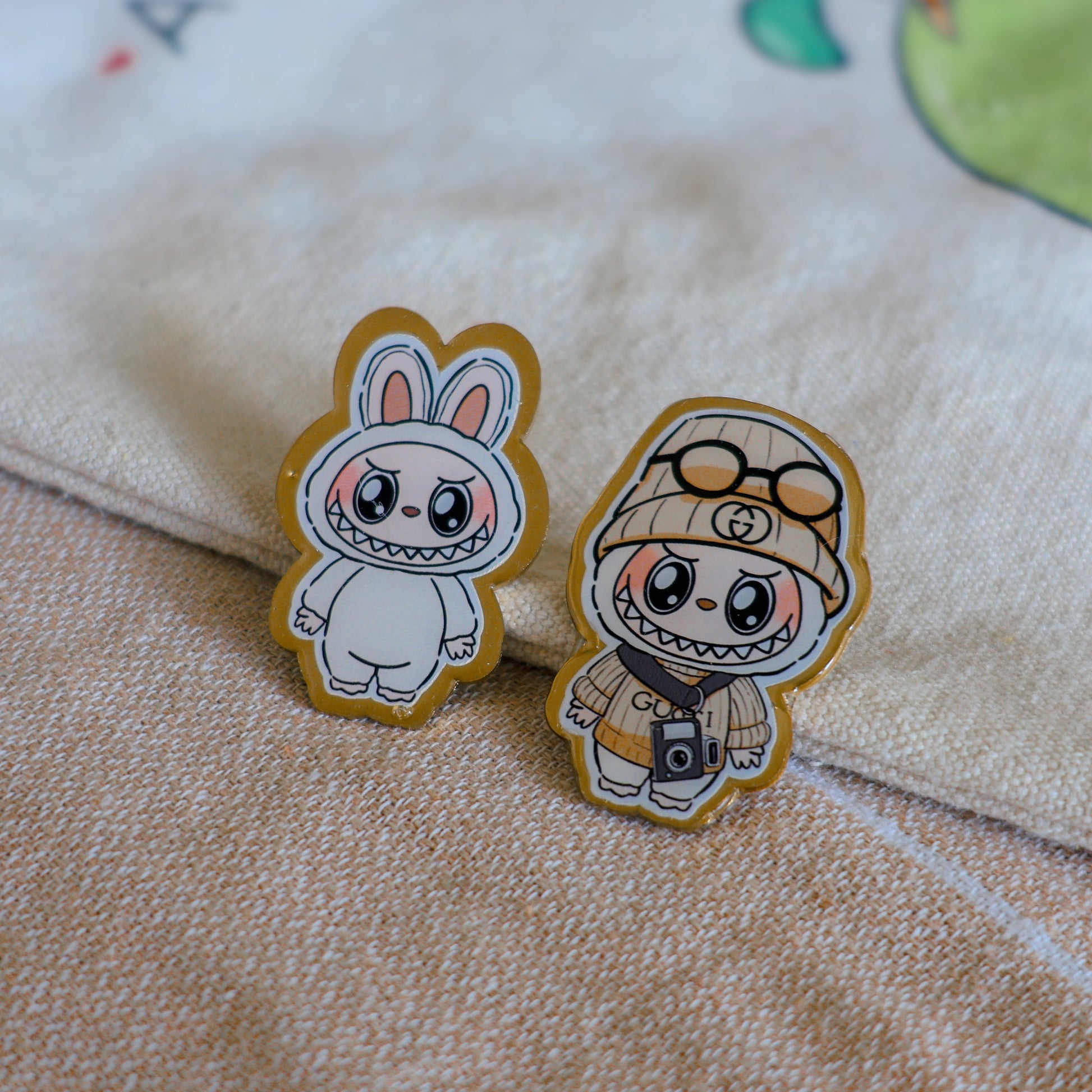Handmade Labubu pin with gold butterfly clasp, featuring a cute character design, perfect for accessorizing bags, jackets, or ita bags. Created by Avocado Artt.