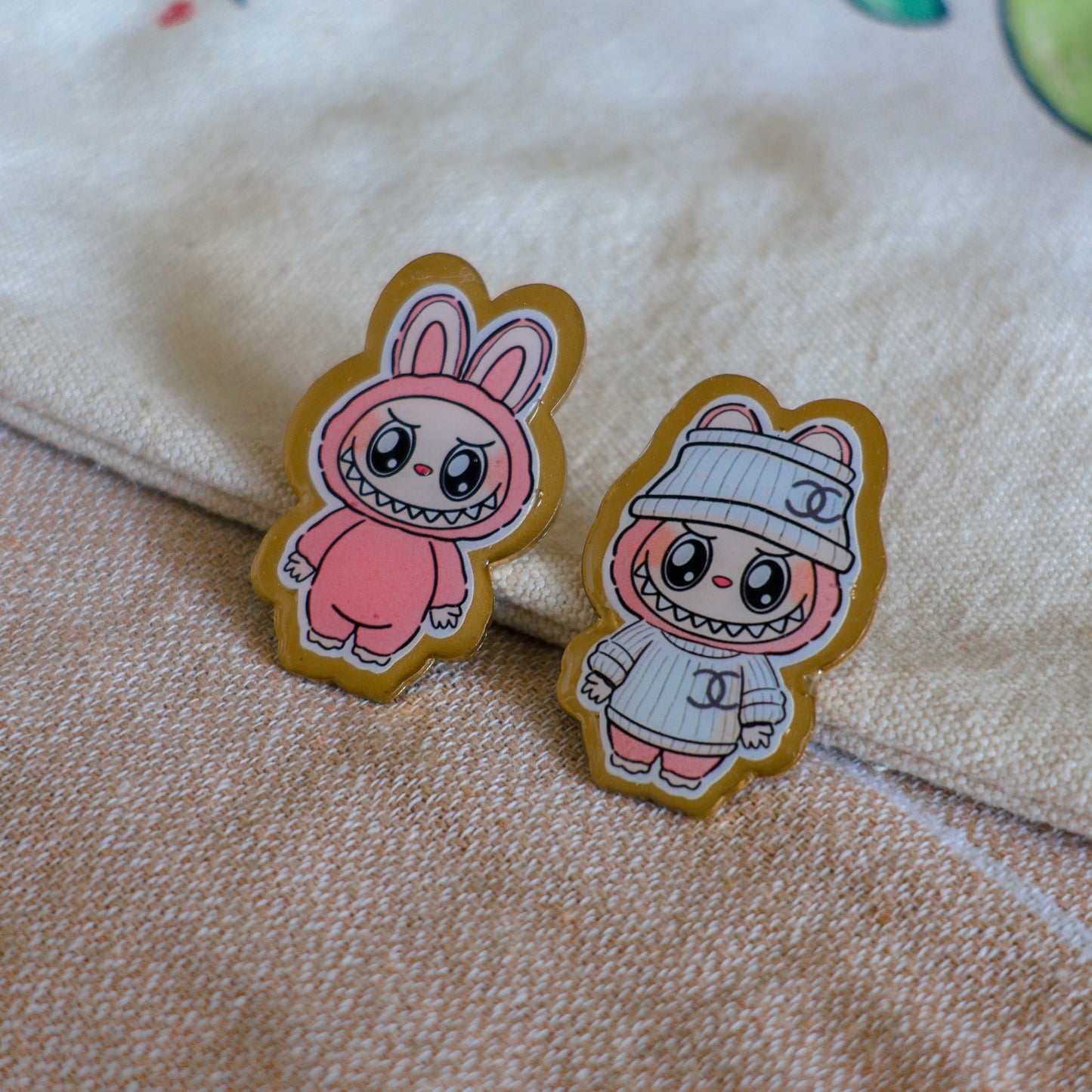 Handmade Labubu pin with gold butterfly clasp, featuring a cute character design, perfect for accessorizing bags, jackets, or ita bags. Created by Avocado Artt.