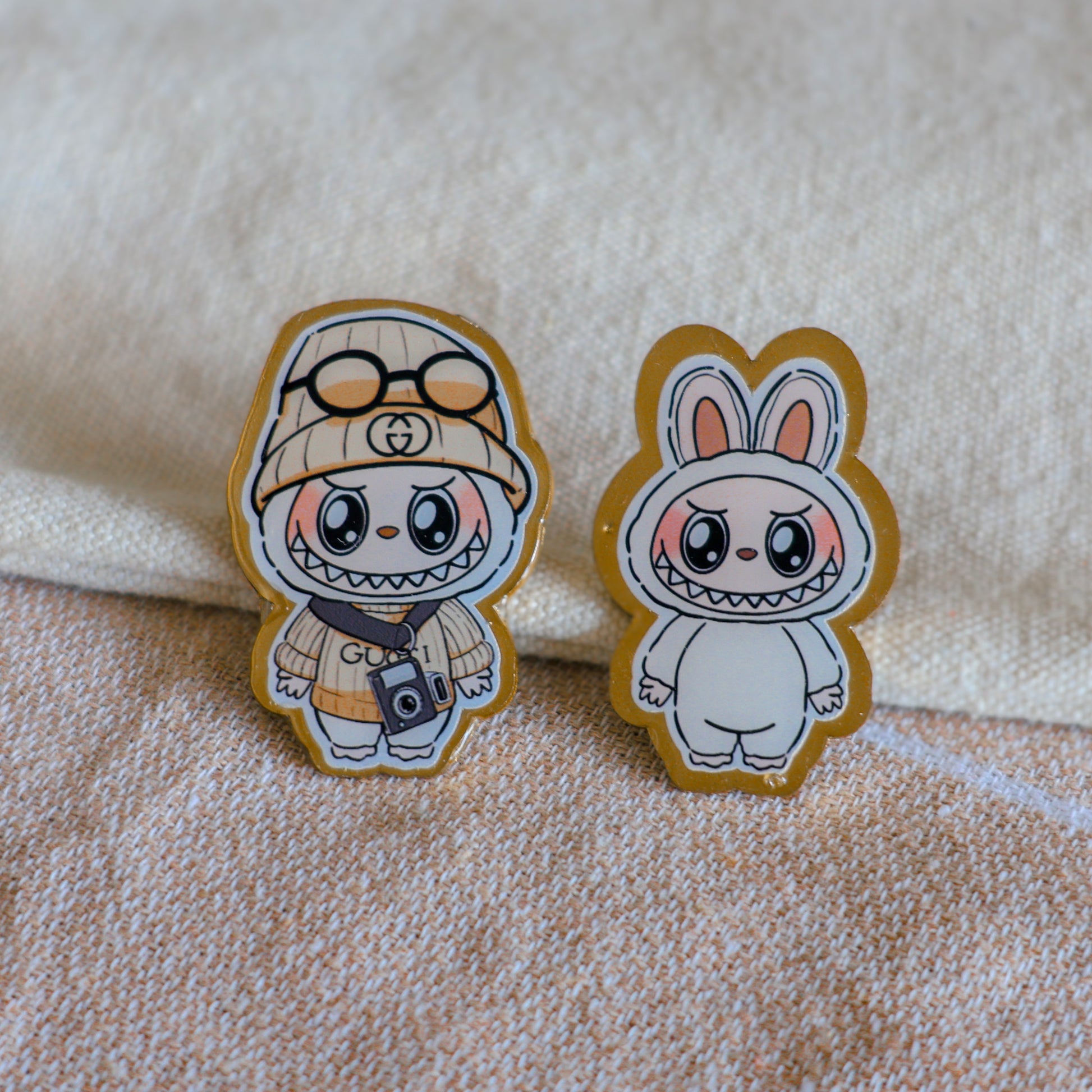 Handmade Labubu pin with gold butterfly clasp, featuring a cute character design, perfect for accessorizing bags, jackets, or ita bags. Created by Avocado Artt.