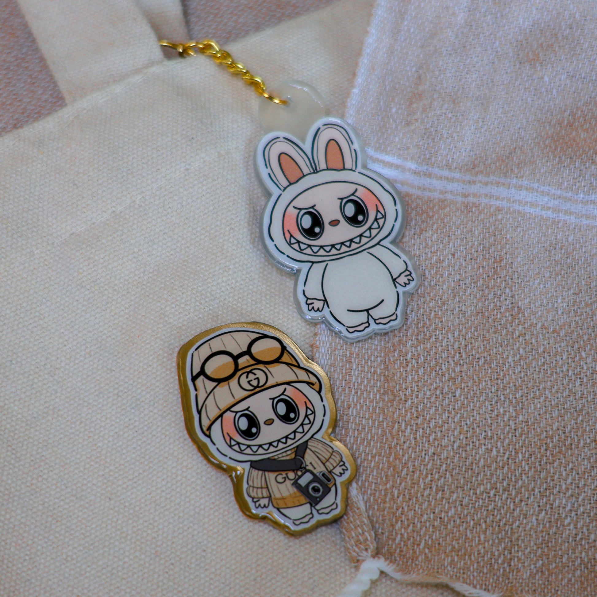 Handmade Labubu pin with gold butterfly clasp, featuring a cute character design, perfect for accessorizing bags, jackets, or ita bags. Created by Avocado Artt.