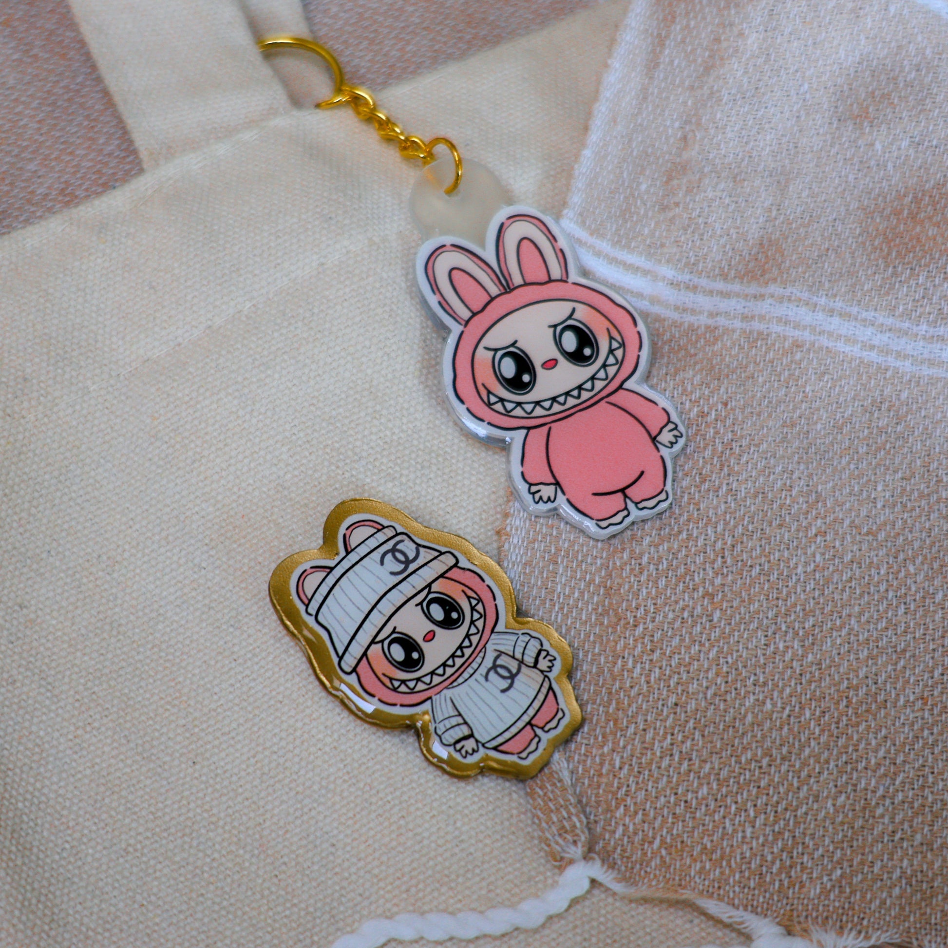 Handmade Labubu pin with gold butterfly clasp, featuring a cute character design, perfect for accessorizing bags, jackets, or ita bags. Created by Avocado Artt.