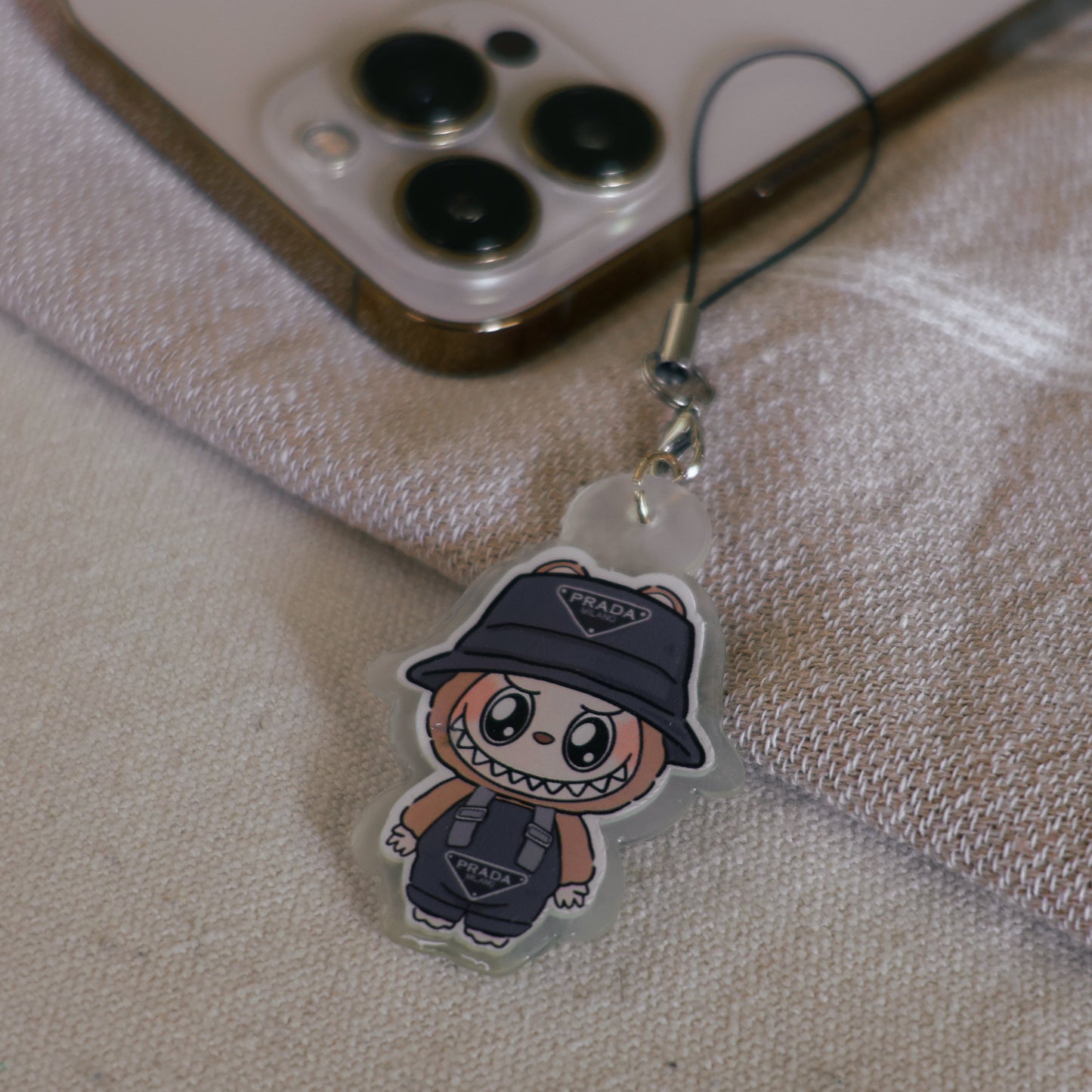 Handmade Labubu phone charm with Silver hardware, featuring a cute character design, perfect for accessorizing phones, bags, or keyrings. Designed by Avocado Artt