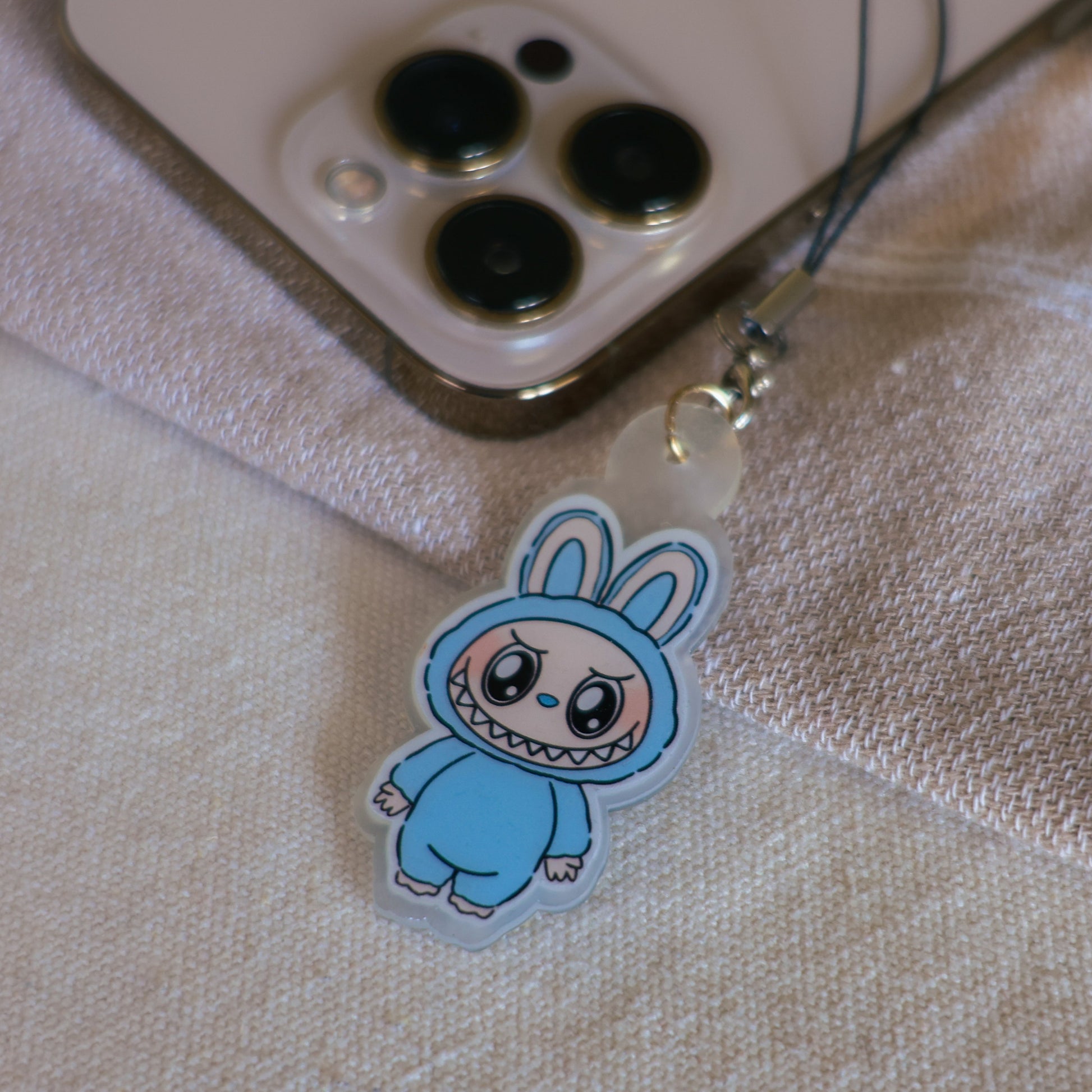 Handmade Labubu phone charm with Silver hardware, featuring a cute character design, perfect for accessorizing phones, bags, or keyrings. Designed by Avocado Artt