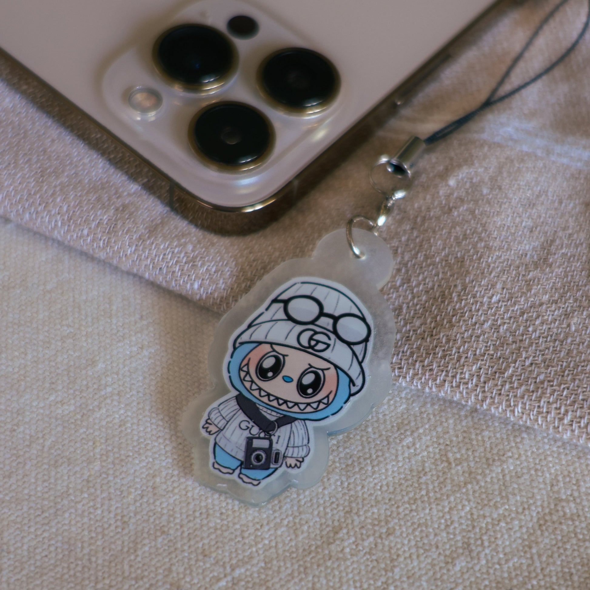 Handmade Labubu phone charm with Silver hardware, featuring a cute character design, perfect for accessorizing phones, bags, or keyrings. Designed by Avocado Artt