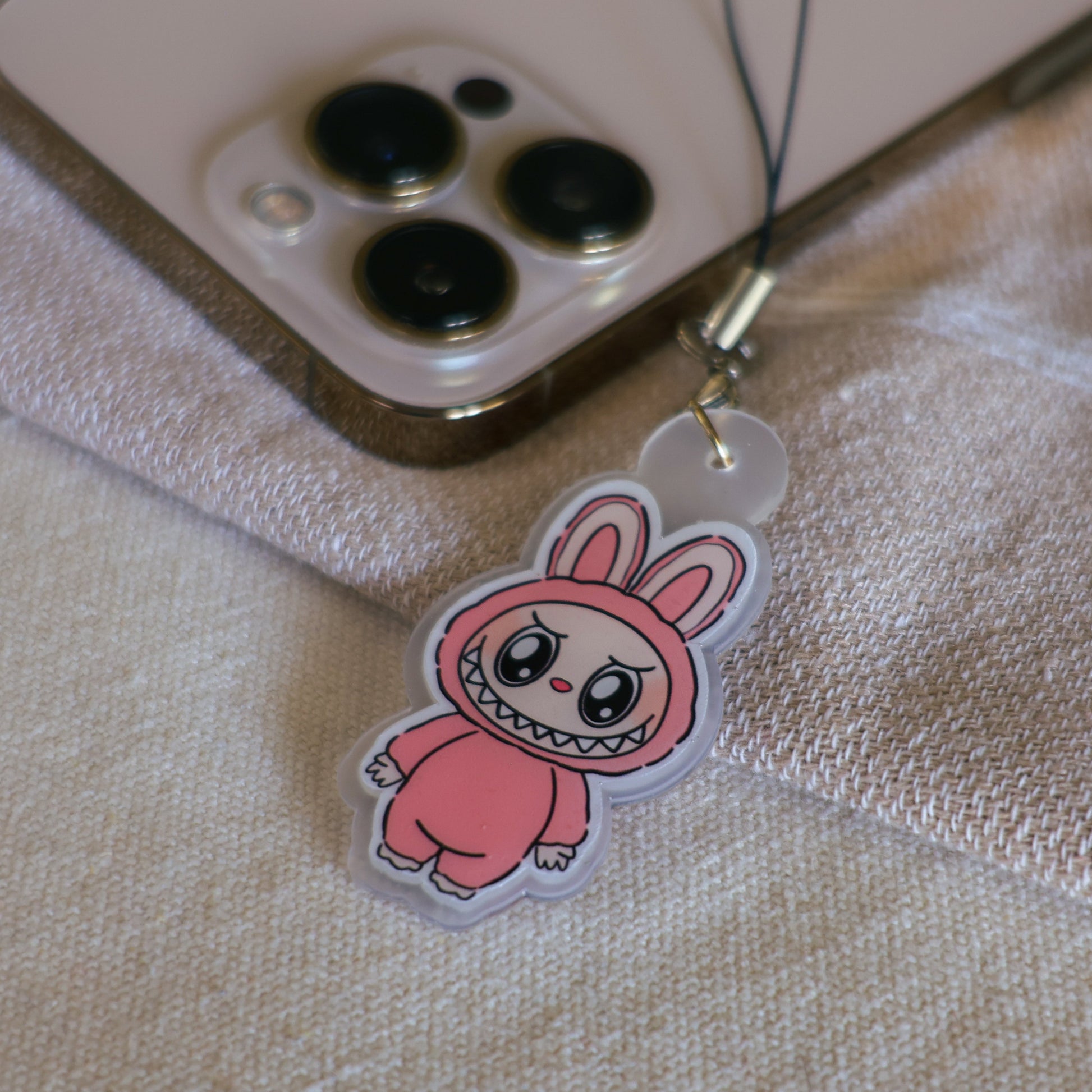 Handmade Labubu phone charm with Silver hardware, featuring a cute character design, perfect for accessorizing phones, bags, or keyrings. Designed by Avocado Artt
