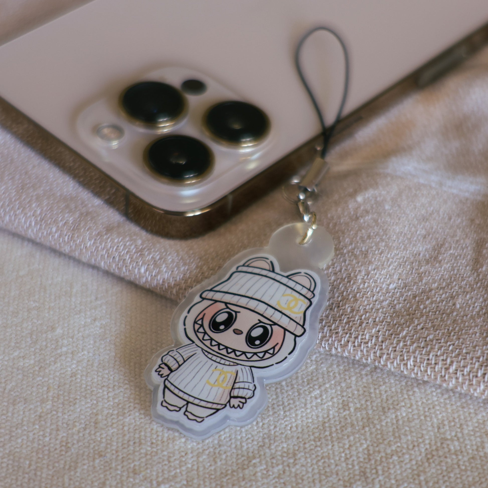 Handmade Labubu phone charm with Silver hardware, featuring a cute character design, perfect for accessorizing phones, bags, or keyrings. Designed by Avocado Artt
