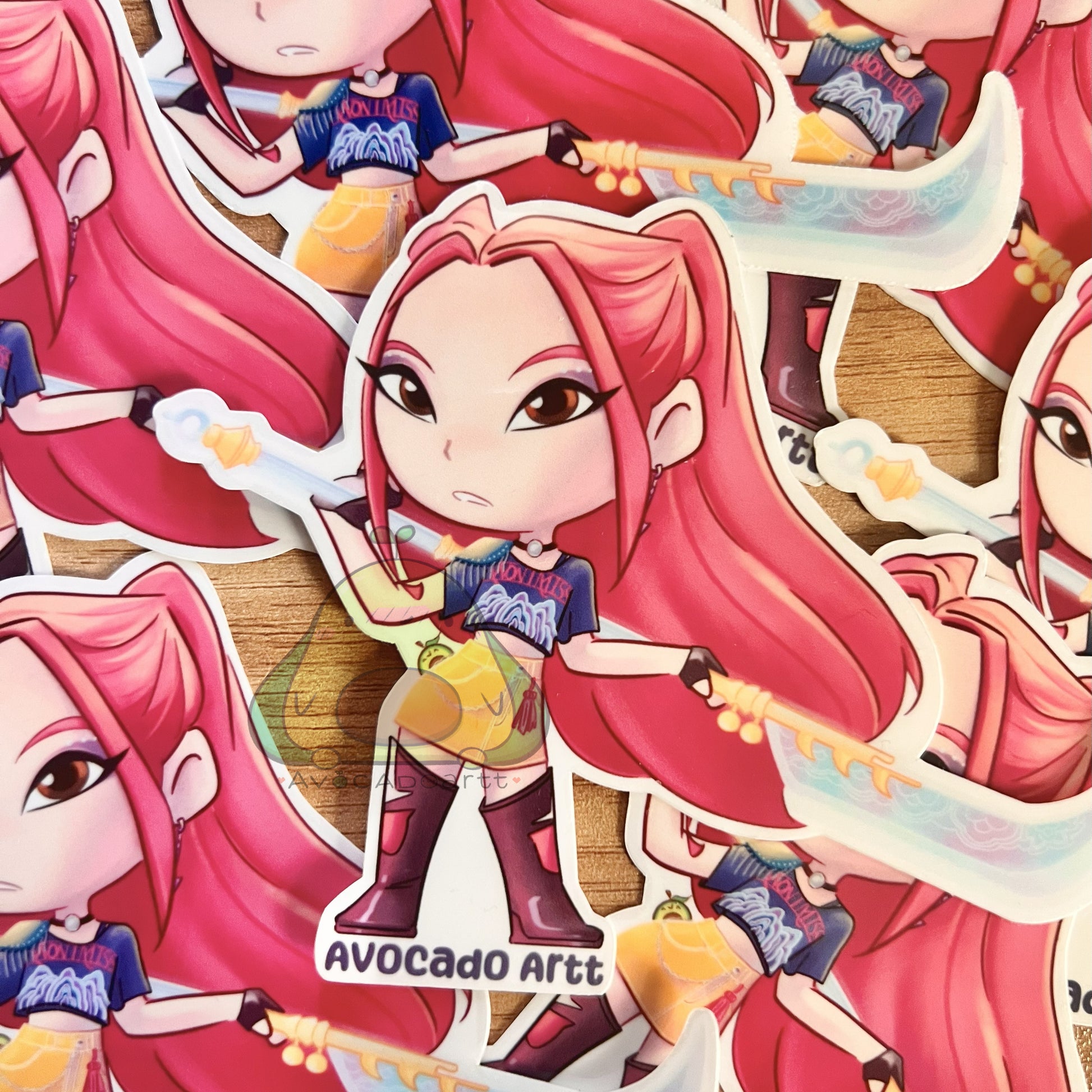 Handmade vinyl sticker of Mira from K-Pop Demon Hunters, illustrated by Avocado Artt, featuring Mira in a bold, idol-inspired outfit with dynamic pose and aesthetic detail.