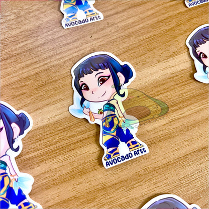 Handmade vinyl sticker of Zoey from K-Pop Demon Hunters, illustrated by Avocado Artt, featuring Zoey in a confident idol pose with detailed outfit and attitude