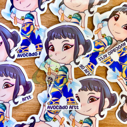 Handmade vinyl sticker of Zoey from K-Pop Demon Hunters, illustrated by Avocado Artt, featuring Zoey in a confident idol pose with detailed outfit and attitude