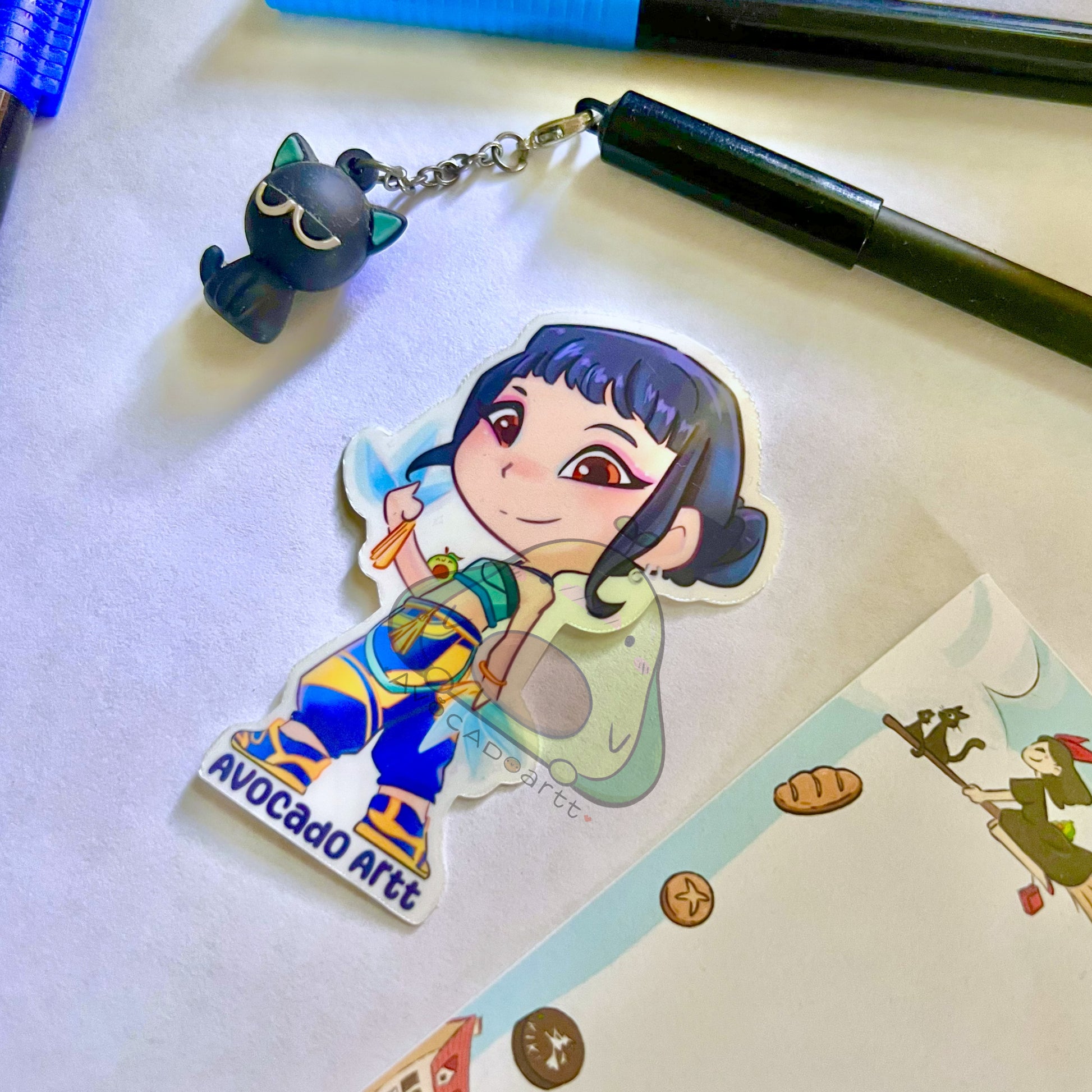 Handmade vinyl sticker of Zoey from K-Pop Demon Hunters, illustrated by Avocado Artt, featuring Zoey in a confident idol pose with detailed outfit and attitude